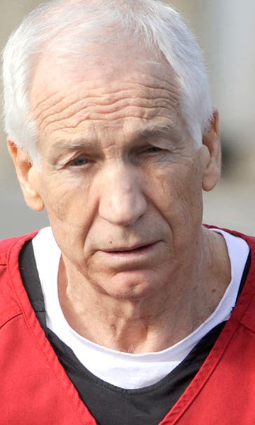 Penn State says settlements covered 1971 Sandusky abuse claim